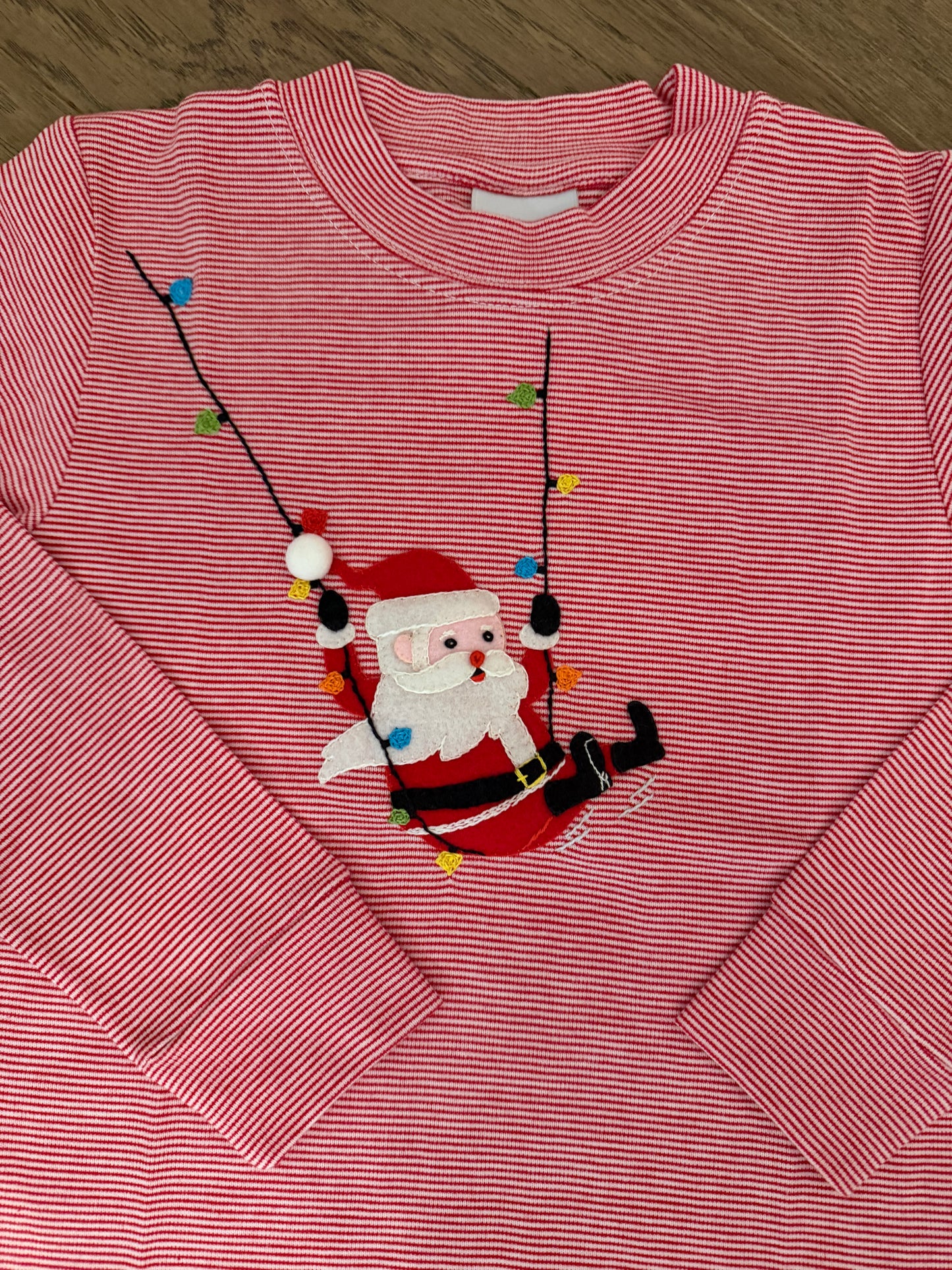 Swinging Santa Long sleeve Crewneck
